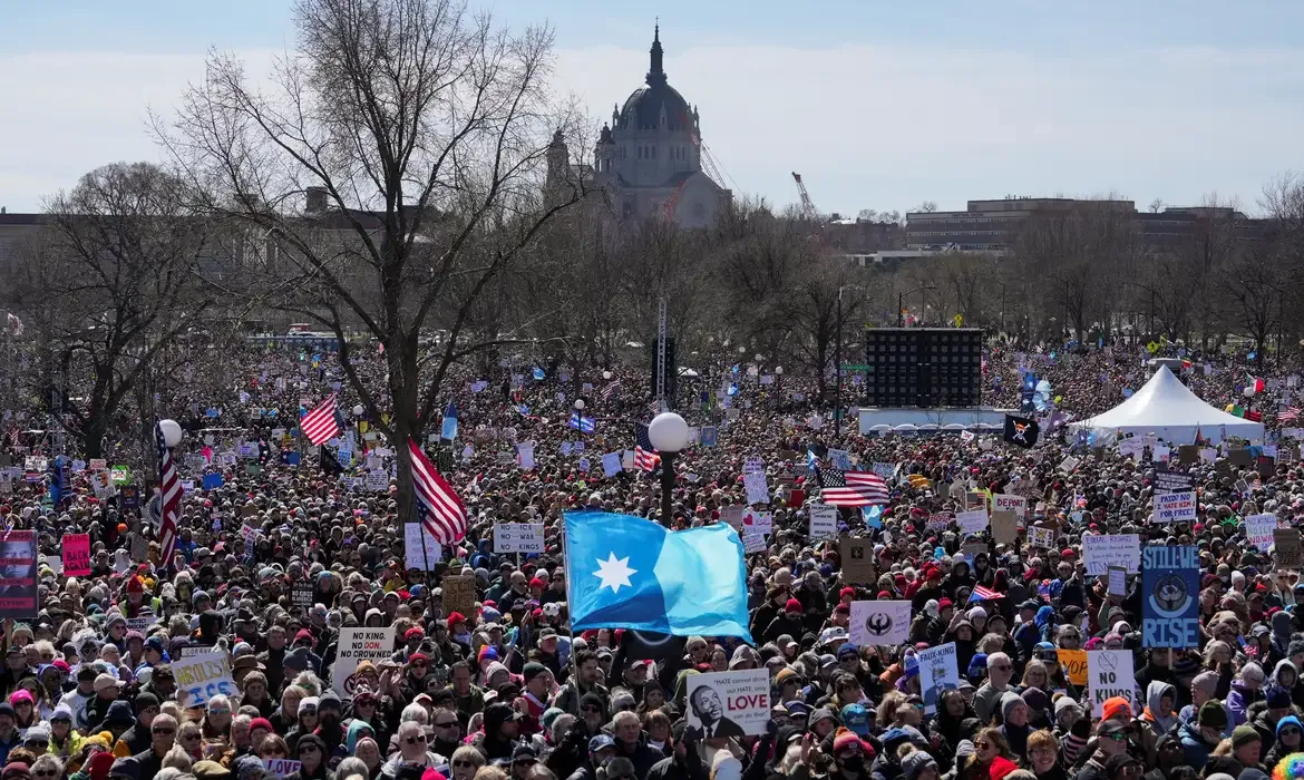 Demonstrators attend a 